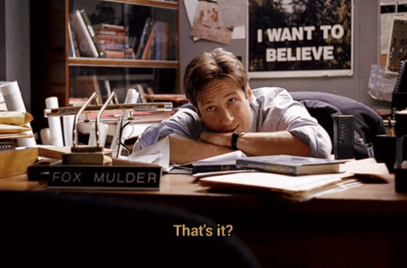 Screenshot of Fox Mulder of the X-Files in his office with his head on his desk, looking up, and asking "That's it?"
